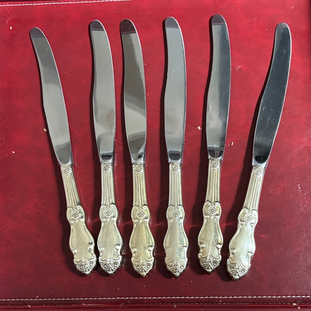 Elegant Silver and Gold Butter Knives Set